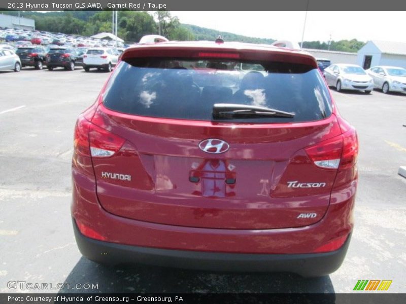 Garnet Red / Taupe 2013 Hyundai Tucson GLS AWD