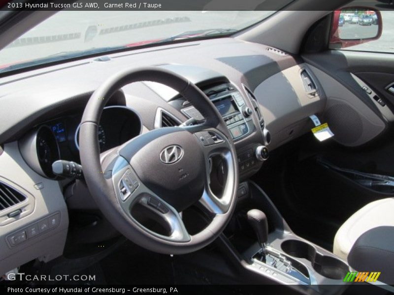 Garnet Red / Taupe 2013 Hyundai Tucson GLS AWD