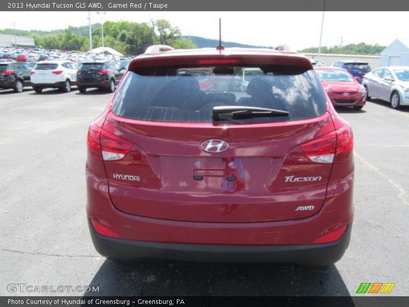 Garnet Red / Taupe 2013 Hyundai Tucson GLS AWD