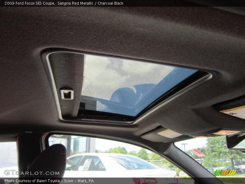 Sangria Red Metallic / Charcoal Black 2009 Ford Focus SES Coupe