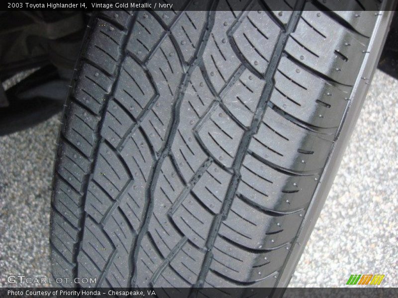 Vintage Gold Metallic / Ivory 2003 Toyota Highlander I4