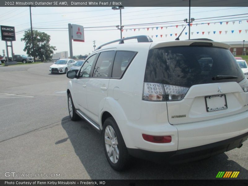 Diamond White Pearl / Black 2012 Mitsubishi Outlander SE AWD