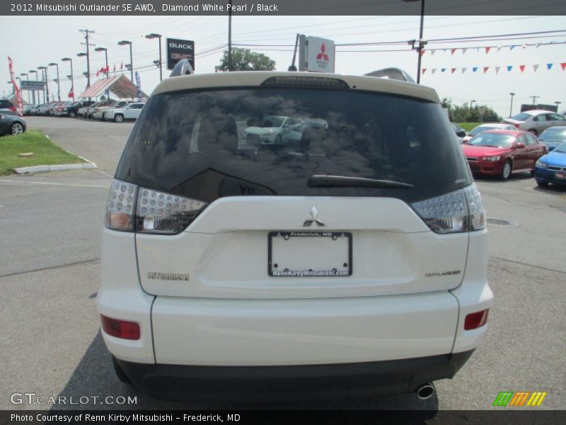 Diamond White Pearl / Black 2012 Mitsubishi Outlander SE AWD