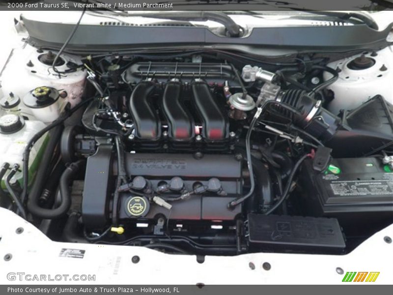 Vibrant White / Medium Parchment 2000 Ford Taurus SE