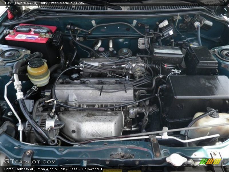 Dark Green Metallic / Gray 1997 Toyota RAV4