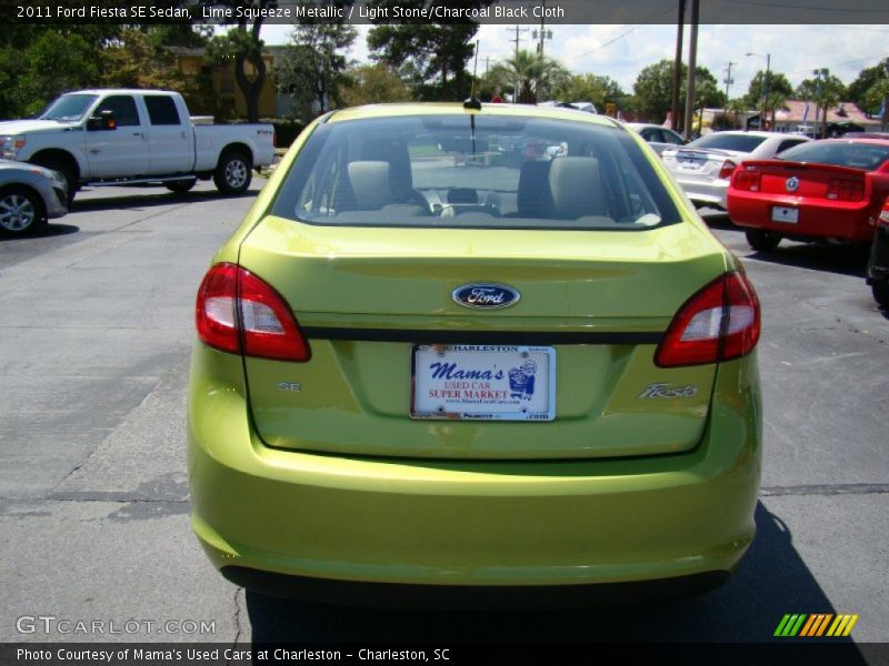 Lime Squeeze Metallic / Light Stone/Charcoal Black Cloth 2011 Ford Fiesta SE Sedan