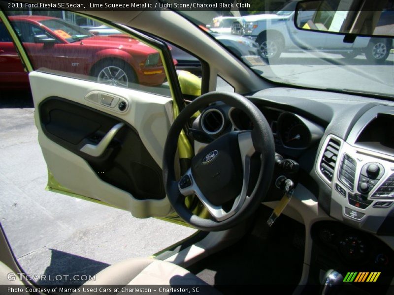 Lime Squeeze Metallic / Light Stone/Charcoal Black Cloth 2011 Ford Fiesta SE Sedan
