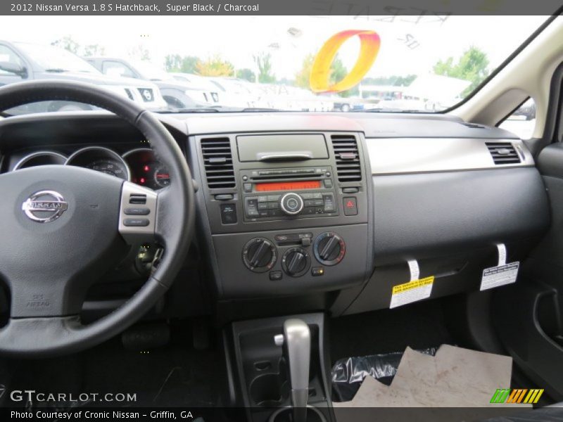 Dashboard of 2012 Versa 1.8 S Hatchback