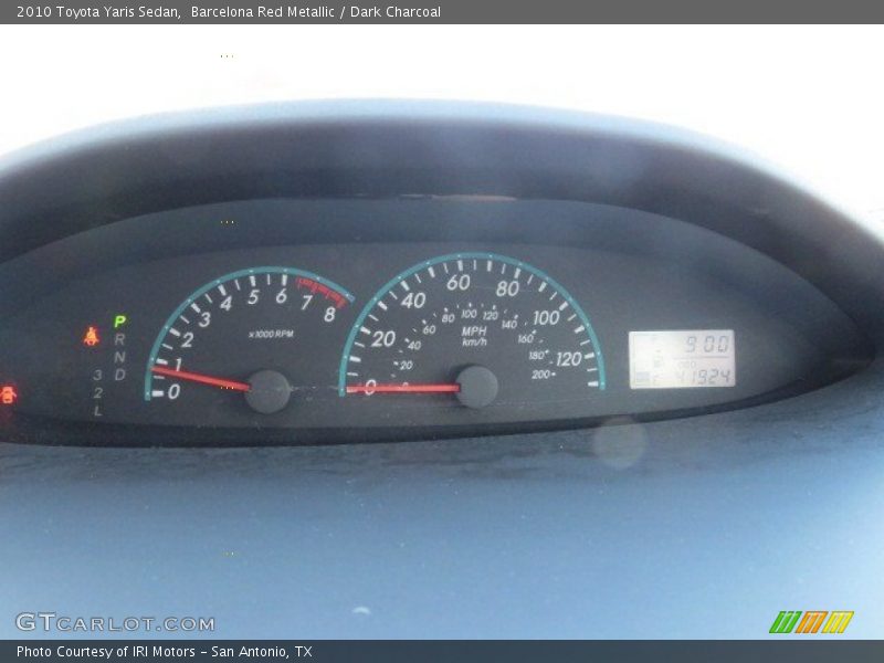 Barcelona Red Metallic / Dark Charcoal 2010 Toyota Yaris Sedan