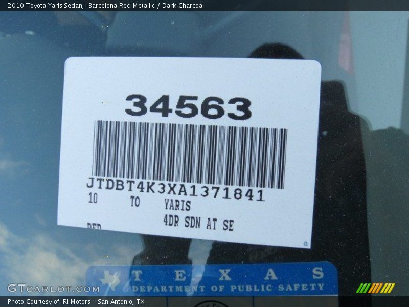 Barcelona Red Metallic / Dark Charcoal 2010 Toyota Yaris Sedan