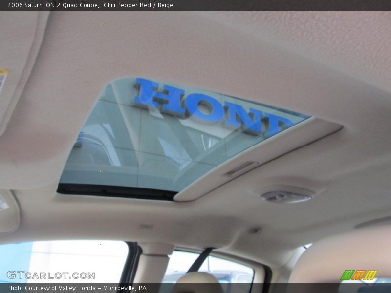 Chili Pepper Red / Beige 2006 Saturn ION 2 Quad Coupe