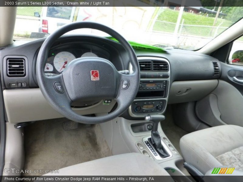 Cream White / Light Tan 2003 Saturn L Series L300 Sedan