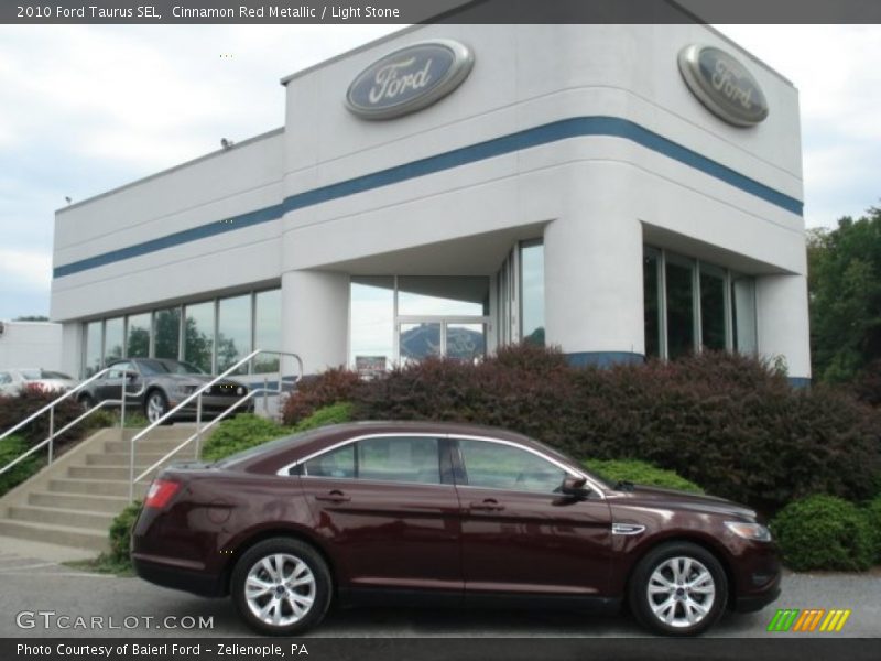 Cinnamon Red Metallic / Light Stone 2010 Ford Taurus SEL