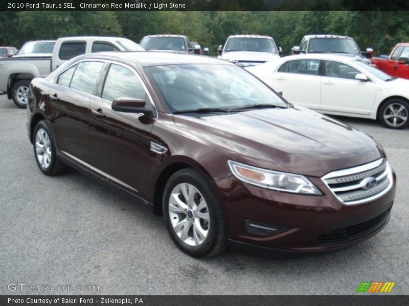 Cinnamon Red Metallic / Light Stone 2010 Ford Taurus SEL