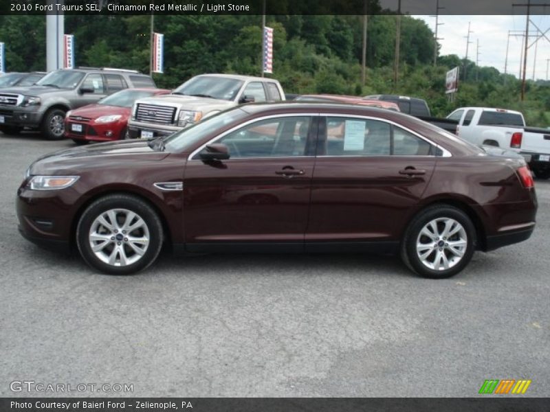 Cinnamon Red Metallic / Light Stone 2010 Ford Taurus SEL