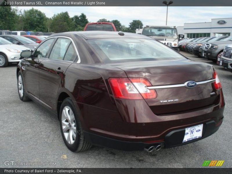 Cinnamon Red Metallic / Light Stone 2010 Ford Taurus SEL