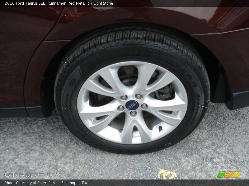 Cinnamon Red Metallic / Light Stone 2010 Ford Taurus SEL