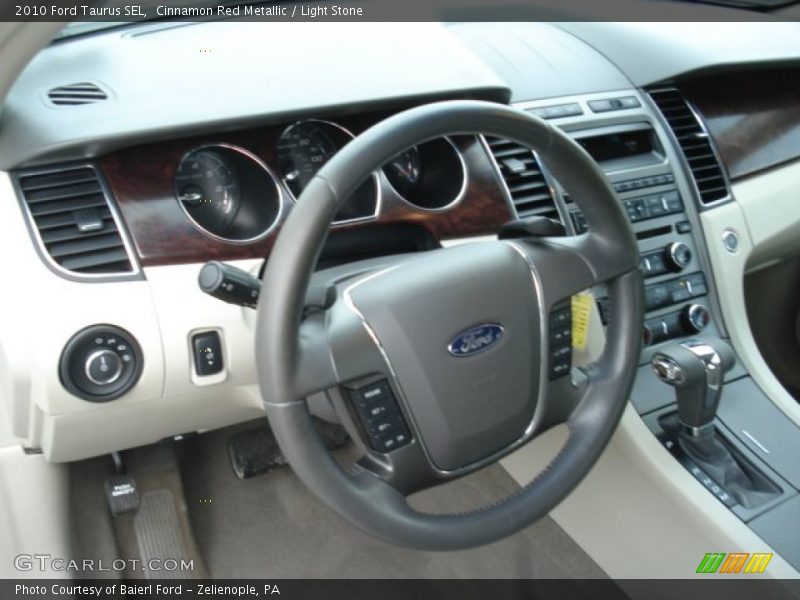 Cinnamon Red Metallic / Light Stone 2010 Ford Taurus SEL