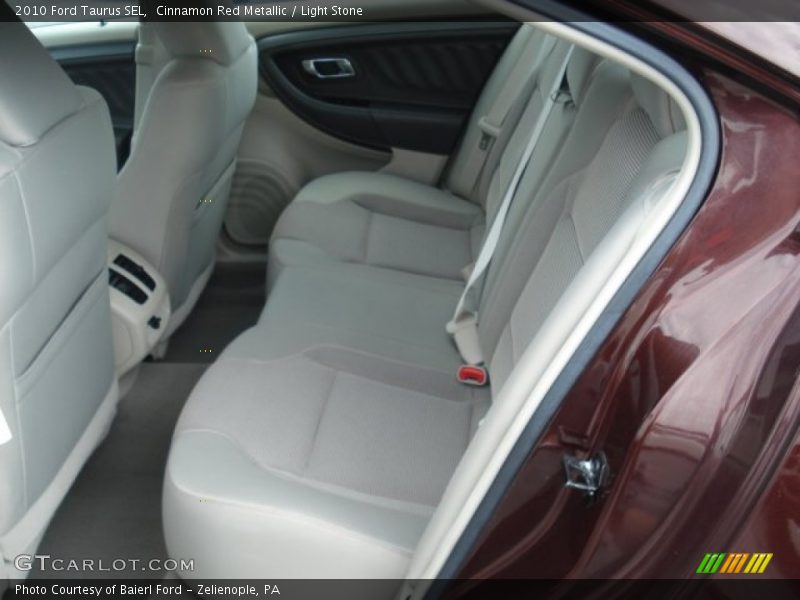 Cinnamon Red Metallic / Light Stone 2010 Ford Taurus SEL
