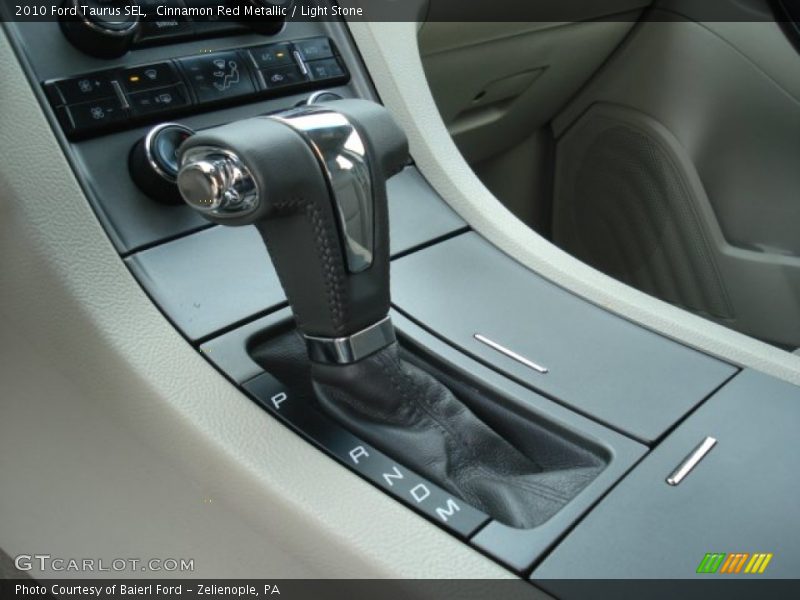 Cinnamon Red Metallic / Light Stone 2010 Ford Taurus SEL