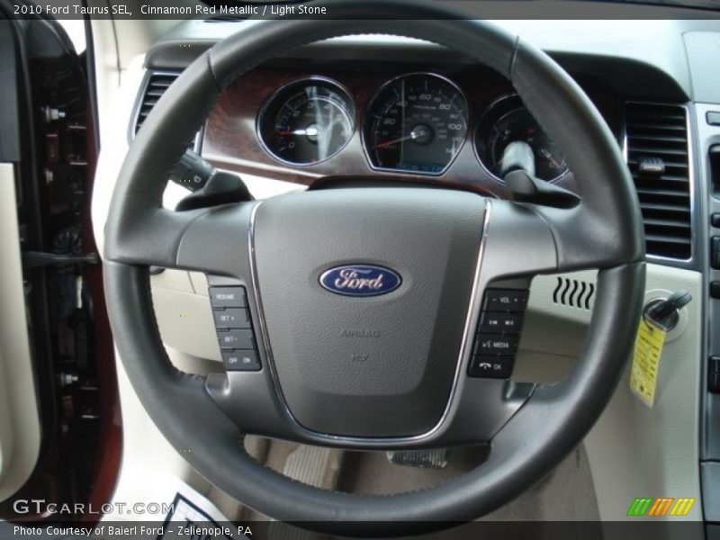 Cinnamon Red Metallic / Light Stone 2010 Ford Taurus SEL