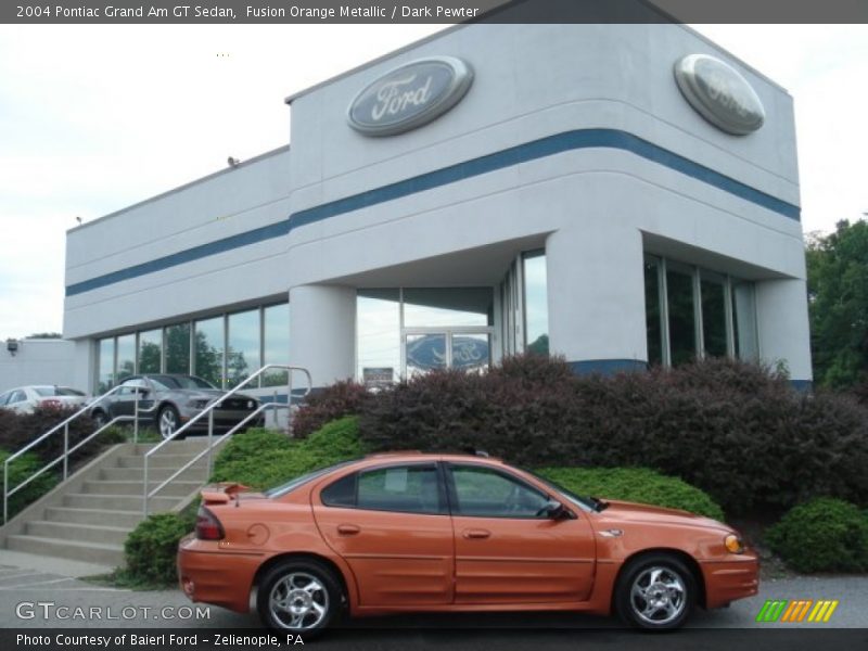 Fusion Orange Metallic / Dark Pewter 2004 Pontiac Grand Am GT Sedan