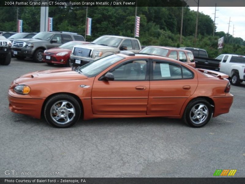 Fusion Orange Metallic / Dark Pewter 2004 Pontiac Grand Am GT Sedan