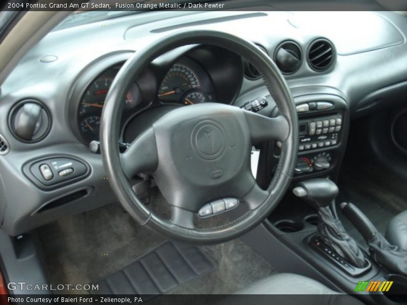Fusion Orange Metallic / Dark Pewter 2004 Pontiac Grand Am GT Sedan
