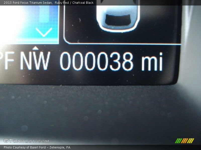 Ruby Red / Charcoal Black 2013 Ford Focus Titanium Sedan