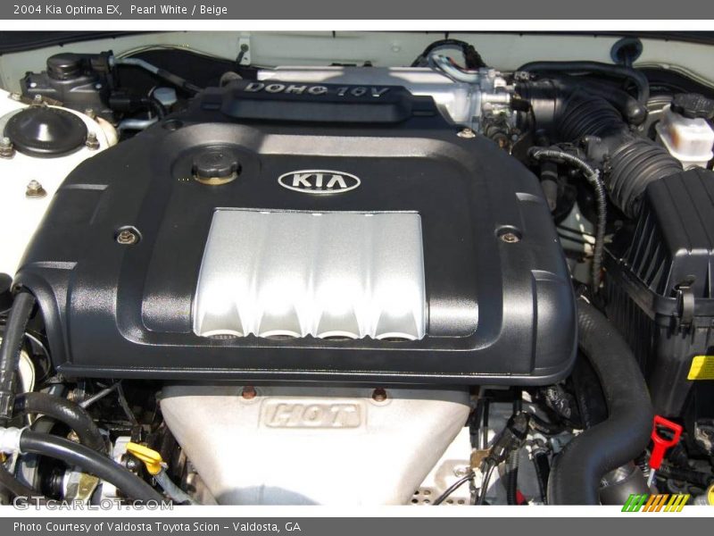 Pearl White / Beige 2004 Kia Optima EX