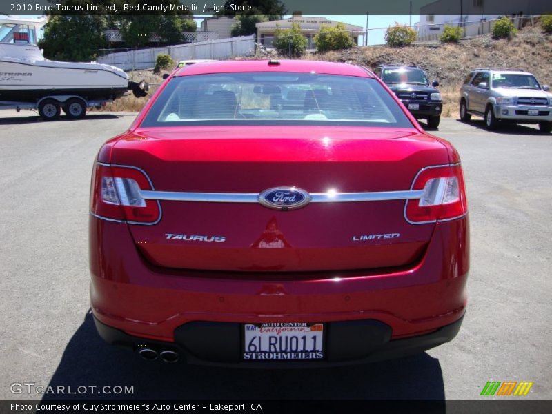 Red Candy Metallic / Light Stone 2010 Ford Taurus Limited