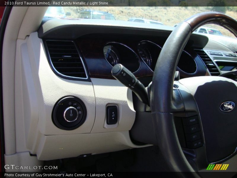 Red Candy Metallic / Light Stone 2010 Ford Taurus Limited
