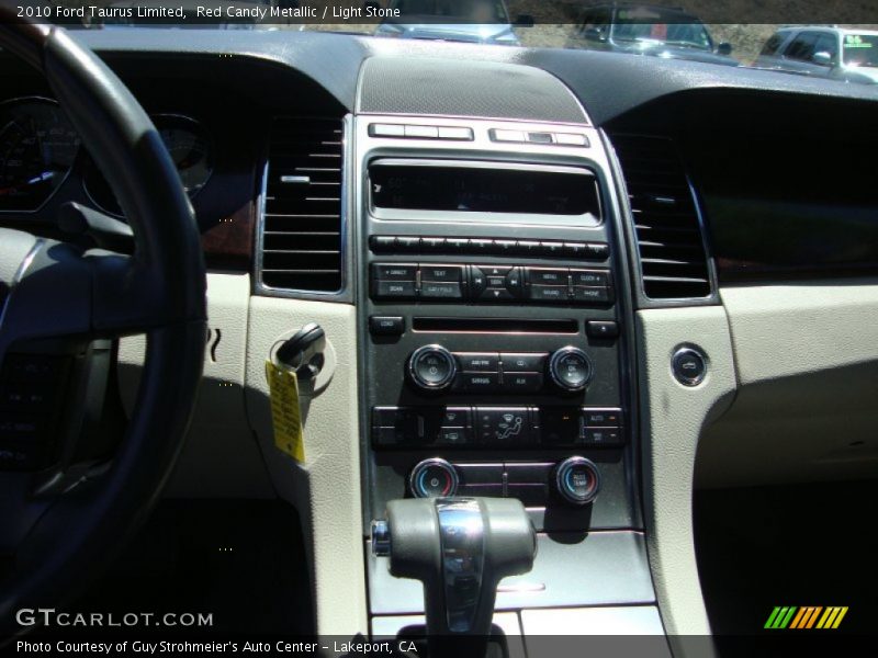 Red Candy Metallic / Light Stone 2010 Ford Taurus Limited