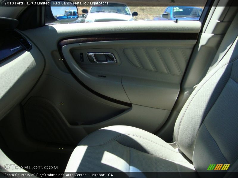 Red Candy Metallic / Light Stone 2010 Ford Taurus Limited