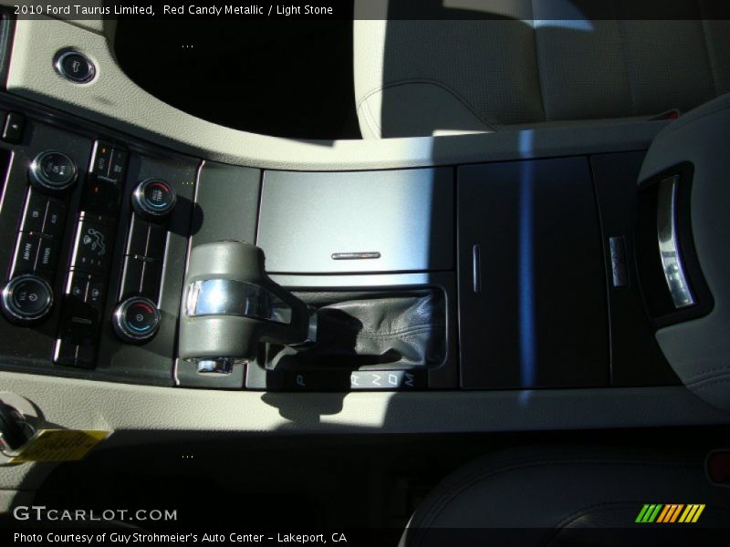 Red Candy Metallic / Light Stone 2010 Ford Taurus Limited