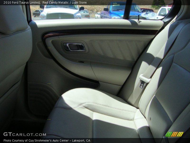 Red Candy Metallic / Light Stone 2010 Ford Taurus Limited