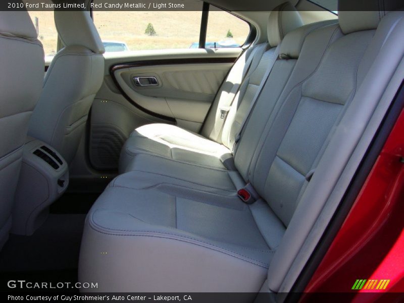 Red Candy Metallic / Light Stone 2010 Ford Taurus Limited