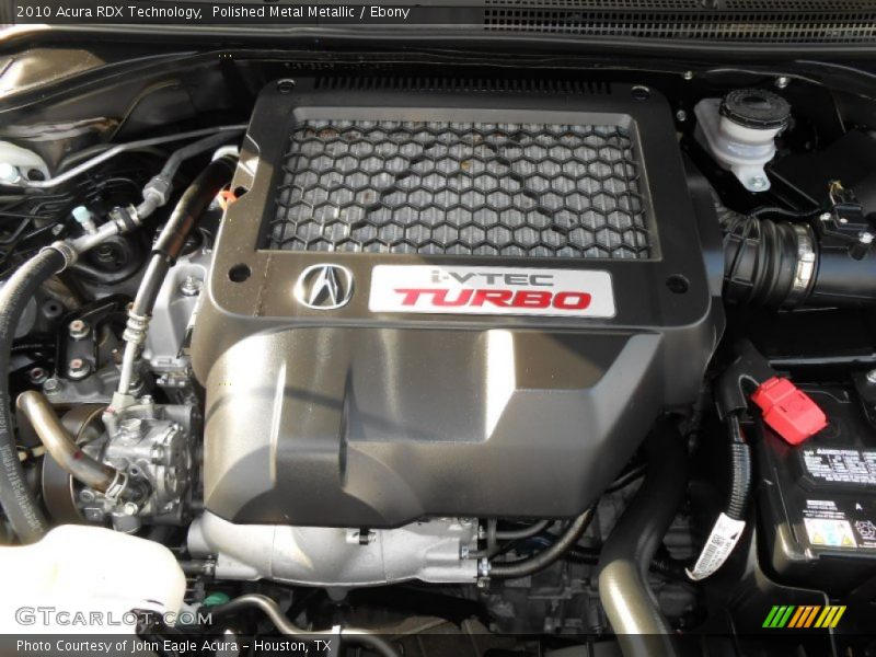 Polished Metal Metallic / Ebony 2010 Acura RDX Technology