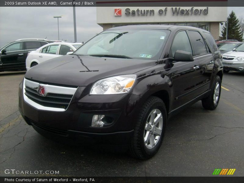 Garnet Red / Black 2009 Saturn Outlook XE AWD