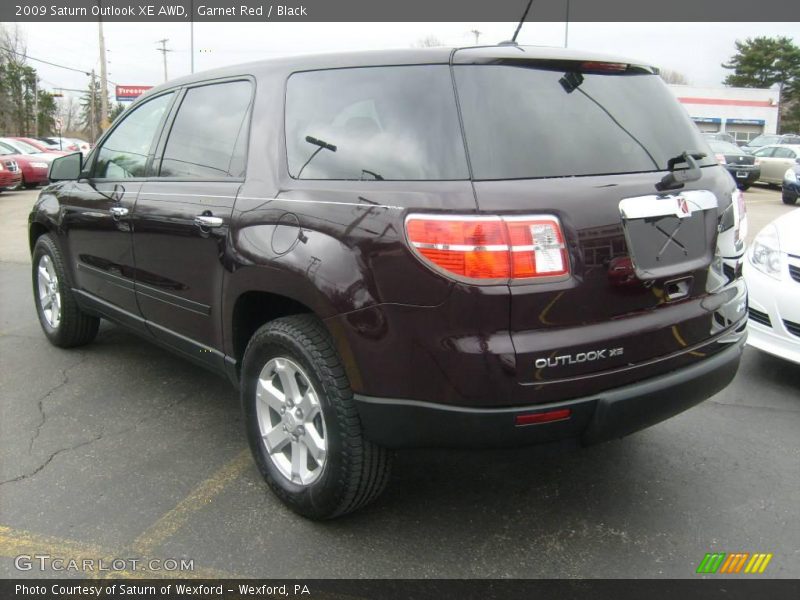 Garnet Red / Black 2009 Saturn Outlook XE AWD