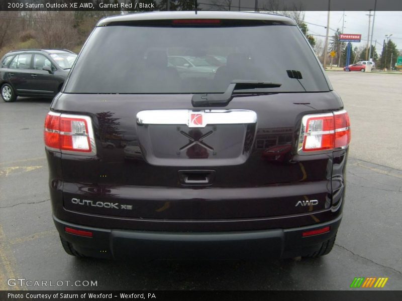 Garnet Red / Black 2009 Saturn Outlook XE AWD
