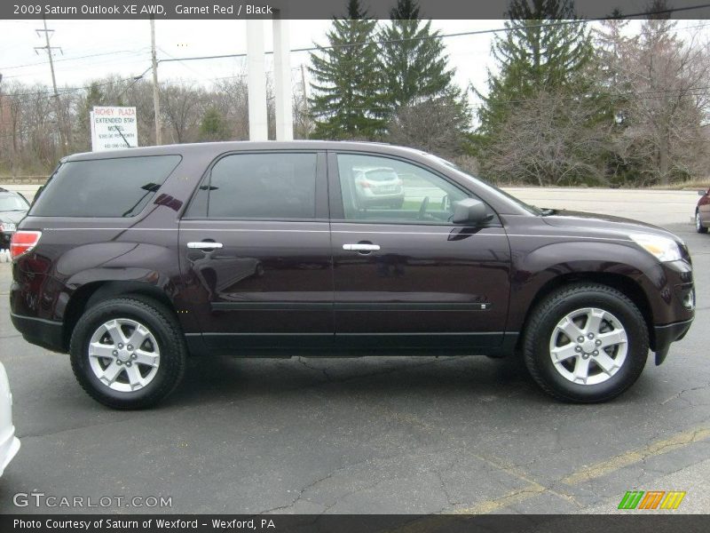 Garnet Red / Black 2009 Saturn Outlook XE AWD