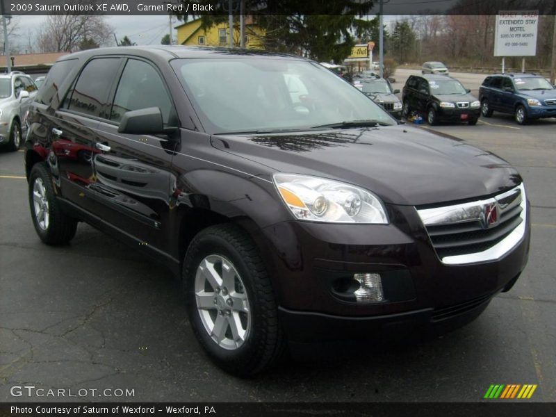 Garnet Red / Black 2009 Saturn Outlook XE AWD