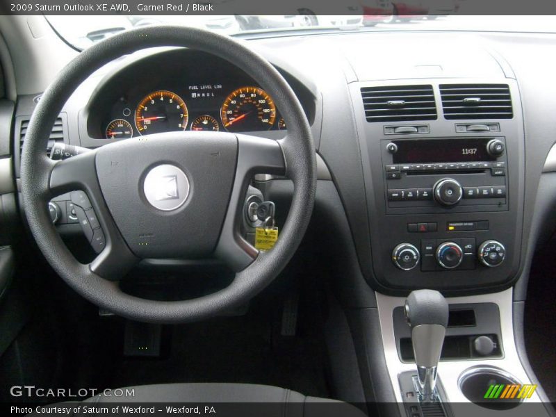 Garnet Red / Black 2009 Saturn Outlook XE AWD