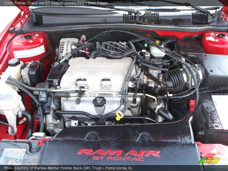 Victory Red / Dark Taupe 2005 Pontiac Grand Am GT Coupe
