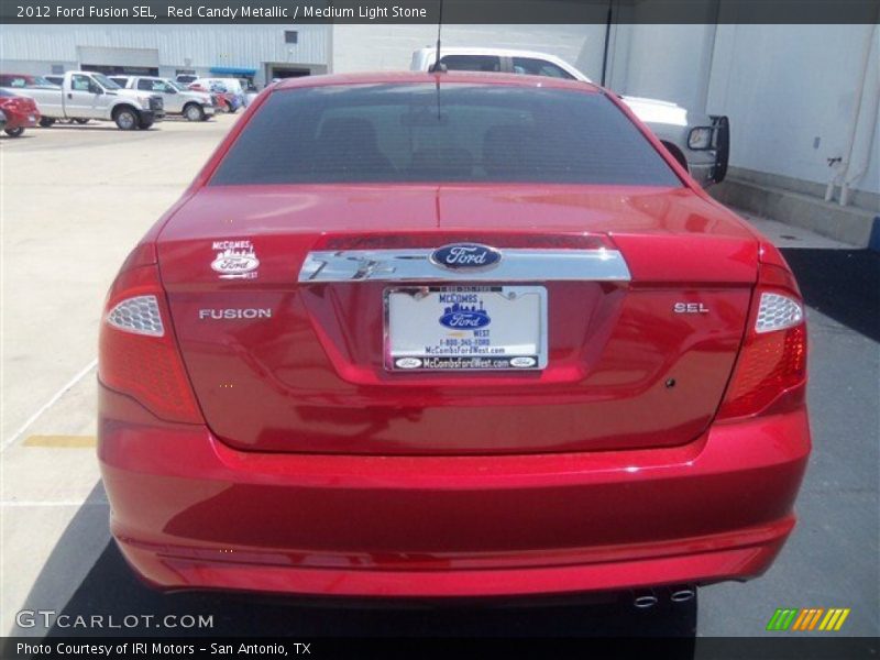 Red Candy Metallic / Medium Light Stone 2012 Ford Fusion SEL