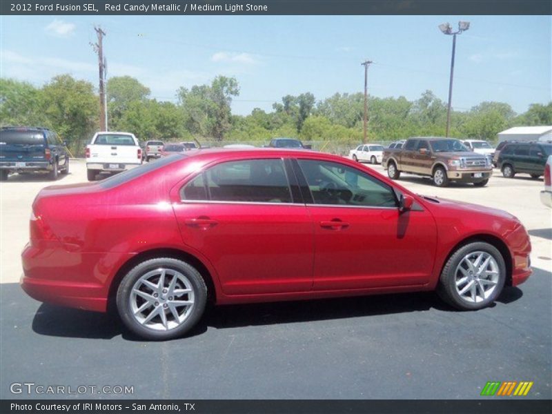 Red Candy Metallic / Medium Light Stone 2012 Ford Fusion SEL