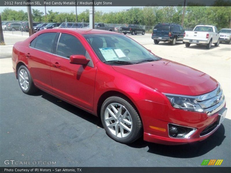 Red Candy Metallic / Medium Light Stone 2012 Ford Fusion SEL