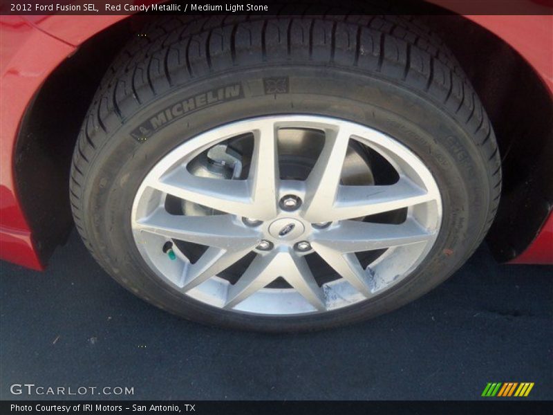 Red Candy Metallic / Medium Light Stone 2012 Ford Fusion SEL