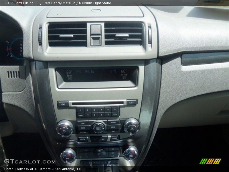 Red Candy Metallic / Medium Light Stone 2012 Ford Fusion SEL